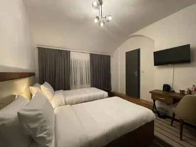 Ein Bett oder Betten in einem Zimmer der Unterkunft Hotel Casa Andalucia
