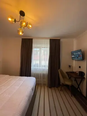 Ein Bett oder Betten in einem Zimmer der Unterkunft Hotel Casa Andalucia