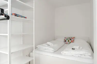 Ein Bett oder Betten in einem Zimmer der Unterkunft Apartment mit Terrasse & Parkplatz in Bad Wörishofen - Skyrise