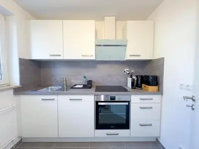 Küche/Küchenzeile in der Unterkunft Apartment mit Terrasse & Parkplatz in Bad Wörishofen - Skyrise