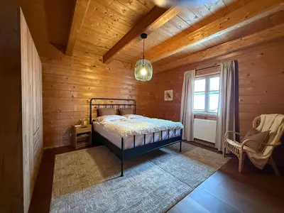 Ein Bett oder Betten in einem Zimmer der Unterkunft Ferienwohnung am Kastanienbaum