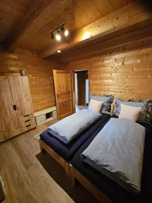 Ein Bett oder Betten in einem Zimmer der Unterkunft Ferienwohnung am Kastanienbaum