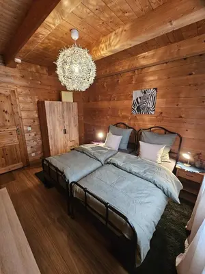 Ein Bett oder Betten in einem Zimmer der Unterkunft Ferienwohnung am Kastanienbaum