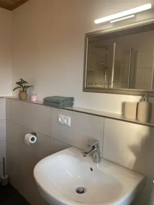 Ein Badezimmer in der Unterkunft Haus Schönblick