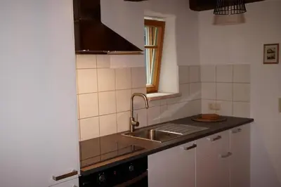 Küche/Küchenzeile in der Unterkunft Ferienwohnung in der Alten Mühle Kirchdorf