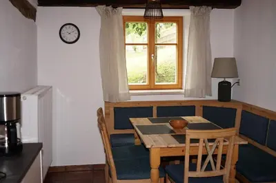 Ein Sitzbereich in der Unterkunft Ferienwohnung in der Alten Mühle Kirchdorf