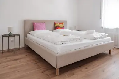 Ein Bett oder Betten in einem Zimmer der Unterkunft Apartment mit Küche & Balkon in Bad Wörishofen - Skyrise