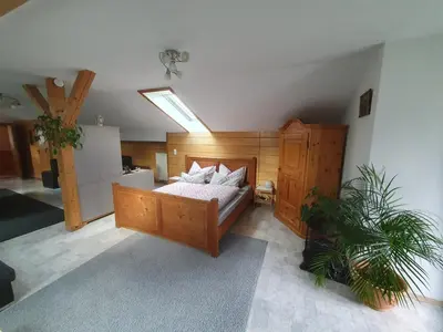 Ein Bett oder Betten in einem Zimmer der Unterkunft Blick zum Riesenkopf