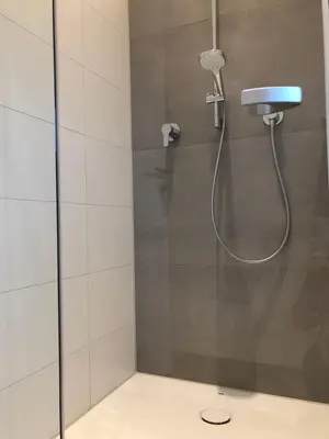 Ein Badezimmer in der Unterkunft FÜNF ROSEN Boutique Apartment - Bio-Ferienwohnung am Staffelsee im Blauen Land