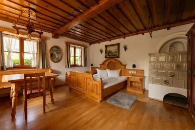 Ein Bett oder Betten in einem Zimmer der Unterkunft Ferienwohnungen Chiemgau