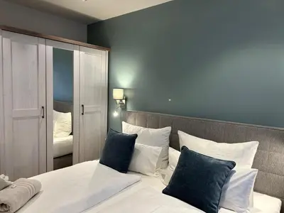 Ein Bett oder Betten in einem Zimmer der Unterkunft ChiemNest Fewo