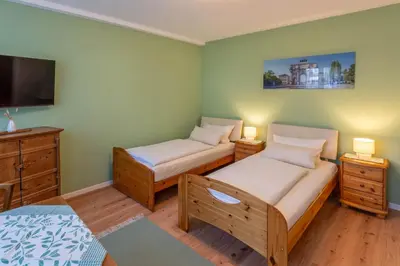 Ein Bett oder Betten in einem Zimmer der Unterkunft Apartments Bauer