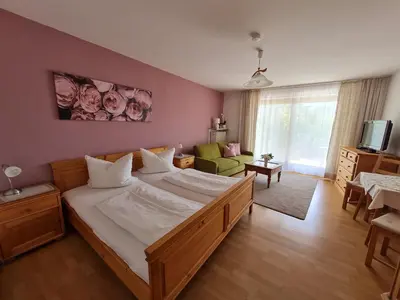 Ein Bett oder Betten in einem Zimmer der Unterkunft Gästehaus Radlerhof