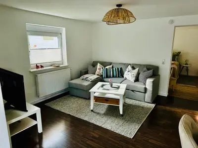 Ein Sitzbereich in der Unterkunft gemütliche Ferienwohnung mit Garten