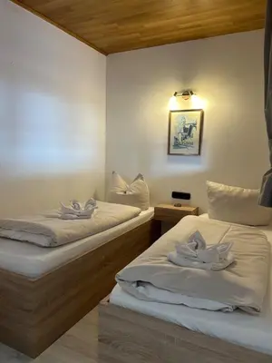 Ein Bett oder Betten in einem Zimmer der Unterkunft Isarperle Fewo