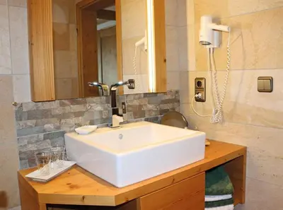 Ein Badezimmer in der Unterkunft Gästehaus Isartal