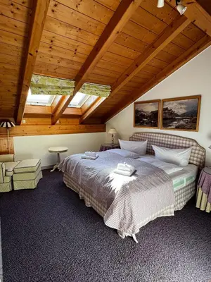 Ein Bett oder Betten in einem Zimmer der Unterkunft Ferienwohnung Kaiserblick Garmisch-Partenkirchen
