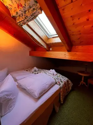 Ein Bett oder Betten in einem Zimmer der Unterkunft Ferienwohnung Kaiserblick Garmisch-Partenkirchen