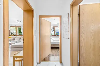 Ein Bett oder Betten in einem Zimmer der Unterkunft CASARiNA - Alpentraum am Barmsee - FeWo Lugge