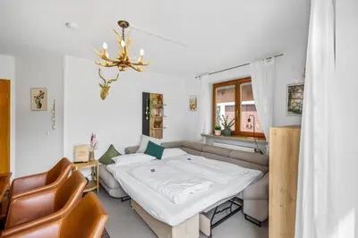 Ein Bett oder Betten in einem Zimmer der Unterkunft CASARiNA - Alpentraum am Barmsee - FeWo Lugge