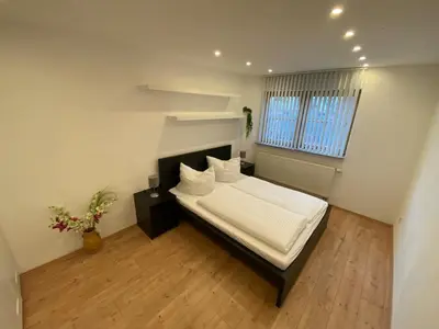 Ein Bett oder Betten in einem Zimmer der Unterkunft Gemütliche Wohnung ruhig gelegen 75qm