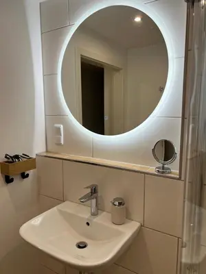 Ein Badezimmer in der Unterkunft Zentrale Wohnen im Grünen auf dem Berg