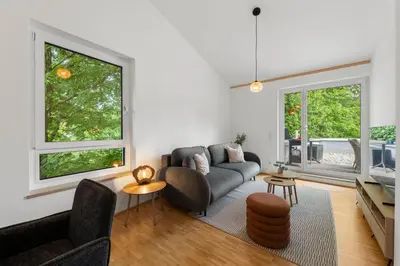 Ein Sitzbereich in der Unterkunft Flussperle Miesbach - Entspannung pur, direkt an der Schlierach, Vollküche, kostenfreies Parken