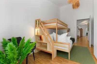 Ein Bett oder Betten in einem Zimmer der Unterkunft Flussperle Miesbach - Entspannung pur, direkt an der Schlierach, Vollküche, kostenfreies Parken