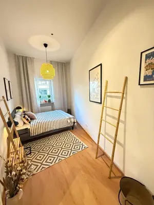 Ein Bett oder Betten in einem Zimmer der Unterkunft BeckHomes Munich, New, central 2BR Apartment with Terrace