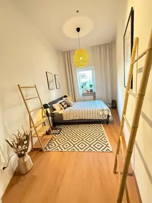 Ein Bett oder Betten in einem Zimmer der Unterkunft BeckHomes Munich, New, central 2BR Apartment with Terrace