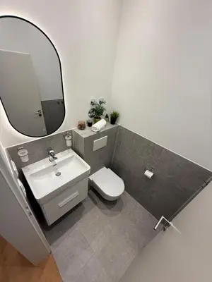 Ein Badezimmer in der Unterkunft BeckHomes Munich, New, central 2BR Apartment with Terrace