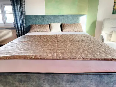 Ein Bett oder Betten in einem Zimmer der Unterkunft Prestige-Apartment-Chiemsee