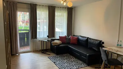 Ein Sitzbereich in der Unterkunft Lindenhof Apartment 10