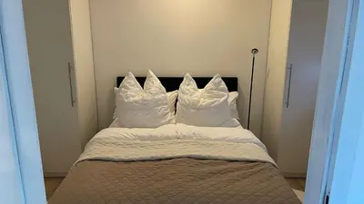 Ein Bett oder Betten in einem Zimmer der Unterkunft Lindenhof Apartment 10
