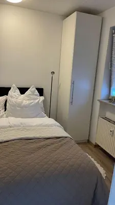 Ein Bett oder Betten in einem Zimmer der Unterkunft Lindenhof Apartment 10