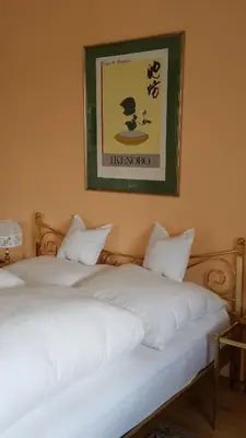 Ein Bett oder Betten in einem Zimmer der Unterkunft Ferienwohnung Gerold