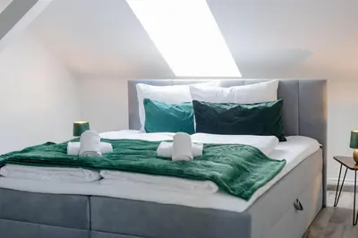 Ein Bett oder Betten in einem Zimmer der Unterkunft UNiQE I 100qm I 2 Schlafzimmer I Nähe Messe