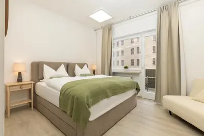 Ein Bett oder Betten in einem Zimmer der Unterkunft City Appartment 150 qm Komfort am Kurpark
