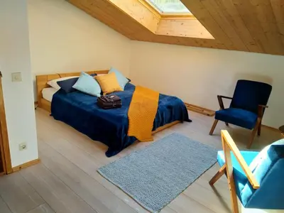 Ein Bett oder Betten in einem Zimmer der Unterkunft Chalet am kleinen See