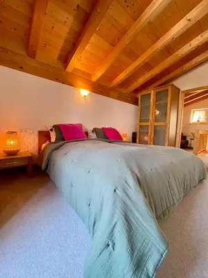 Ein Bett oder Betten in einem Zimmer der Unterkunft Ferienhaus Gollbichl