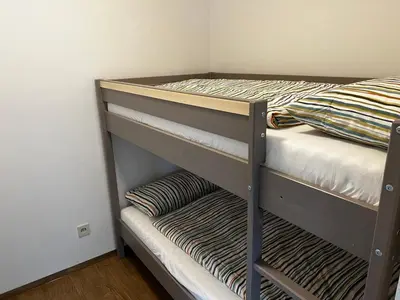 Ein Bett oder Betten in einem Zimmer der Unterkunft Apartment in Prien am Chiemsee