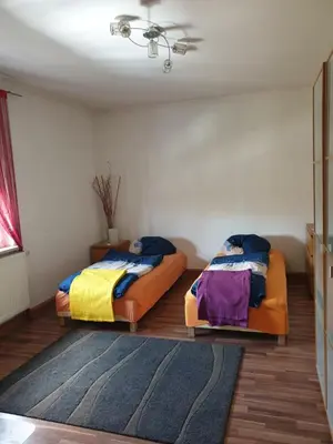 Ein Bett oder Betten in einem Zimmer der Unterkunft Im Cube