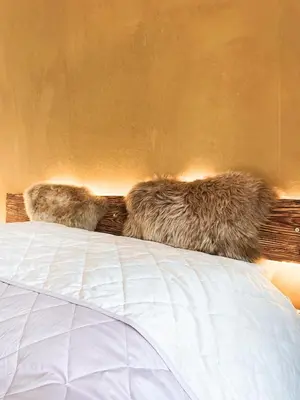 Ein Bett oder Betten in einem Zimmer der Unterkunft Exklusives Design Hideaway & Sauna