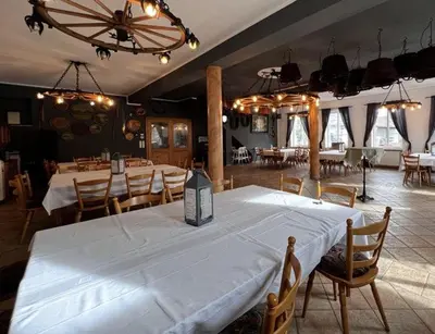 Ein Restaurant oder anderes Speiselokal in der Unterkunft Metzgerwirt