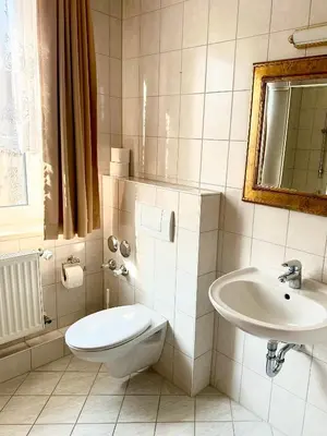 Ein Badezimmer in der Unterkunft Metzgerwirt