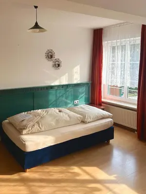 Ein Bett oder Betten in einem Zimmer der Unterkunft Metzgerwirt