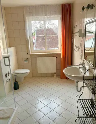 Ein Badezimmer in der Unterkunft Metzgerwirt