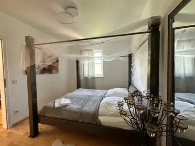 Ein Bett oder Betten in einem Zimmer der Unterkunft Escape by Landhaus Lindenberg