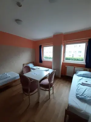 Ein Bett oder Betten in einem Zimmer der Unterkunft 2-Rent Group Hostel Rooms&Apartments TUB19A