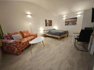 Ein Sitzbereich in der Unterkunft Apartment in Landsberg, Erpfting